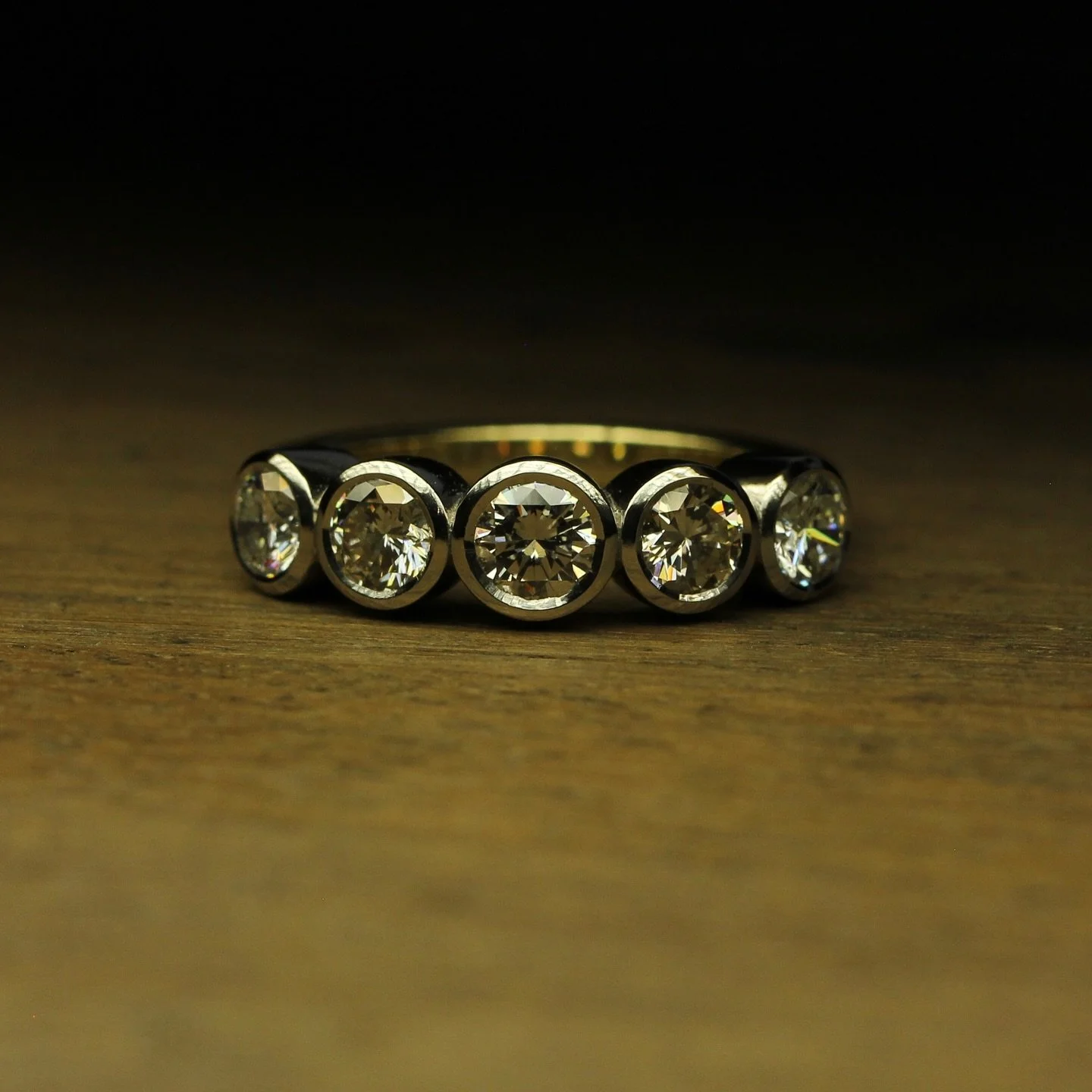 Crisp platinum bezels, encapsulating the diamonds. 5 special diamonds, from rings which hold a thousand memories. 

Jewellery holds a deep personal connection. Often brought with emotion not desire. 

We think that&rsquo;s how jewellery should be app