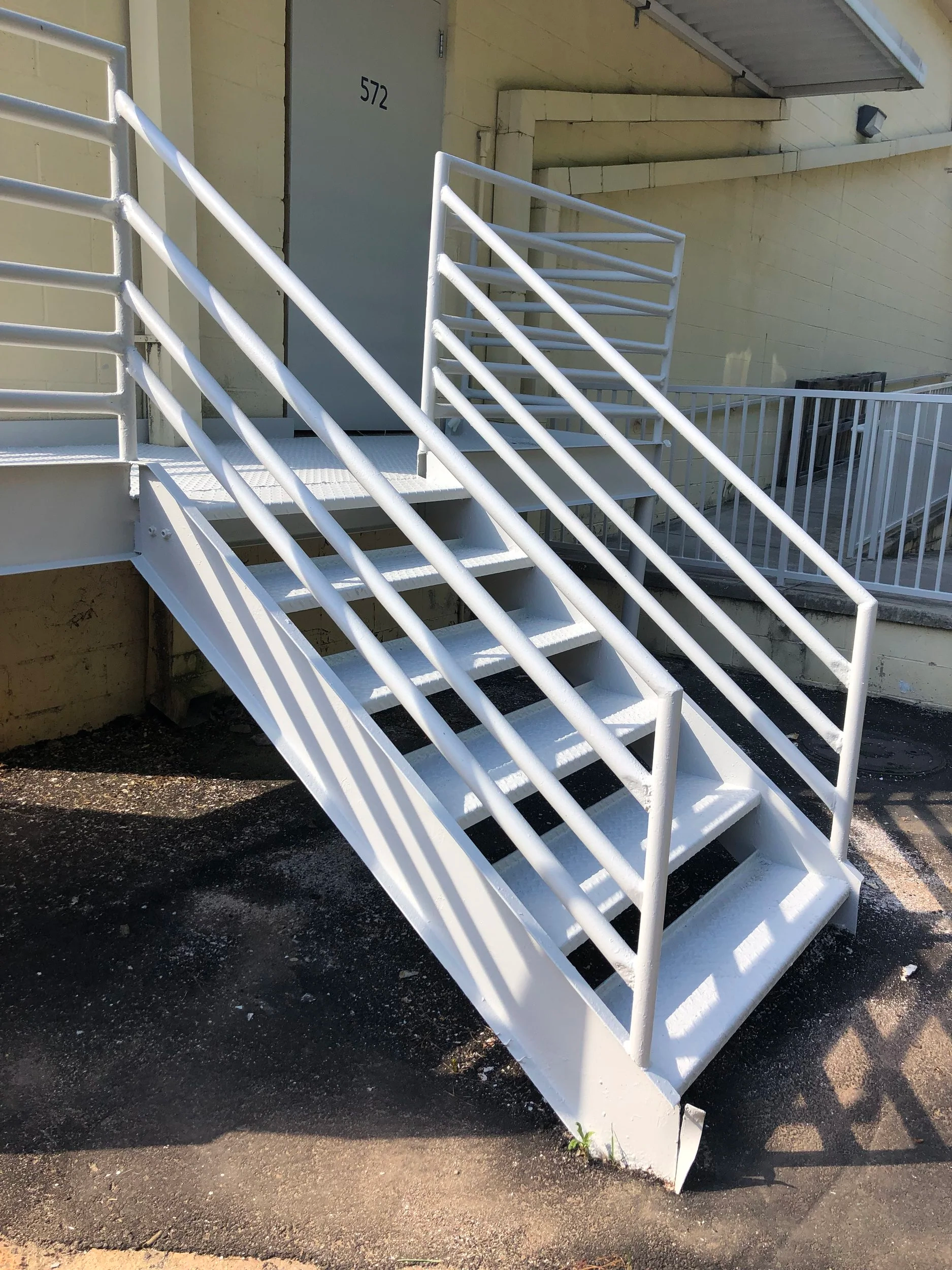 Shopping Center rear stairs/doors/bollards, Raleigh & Archdale NC
