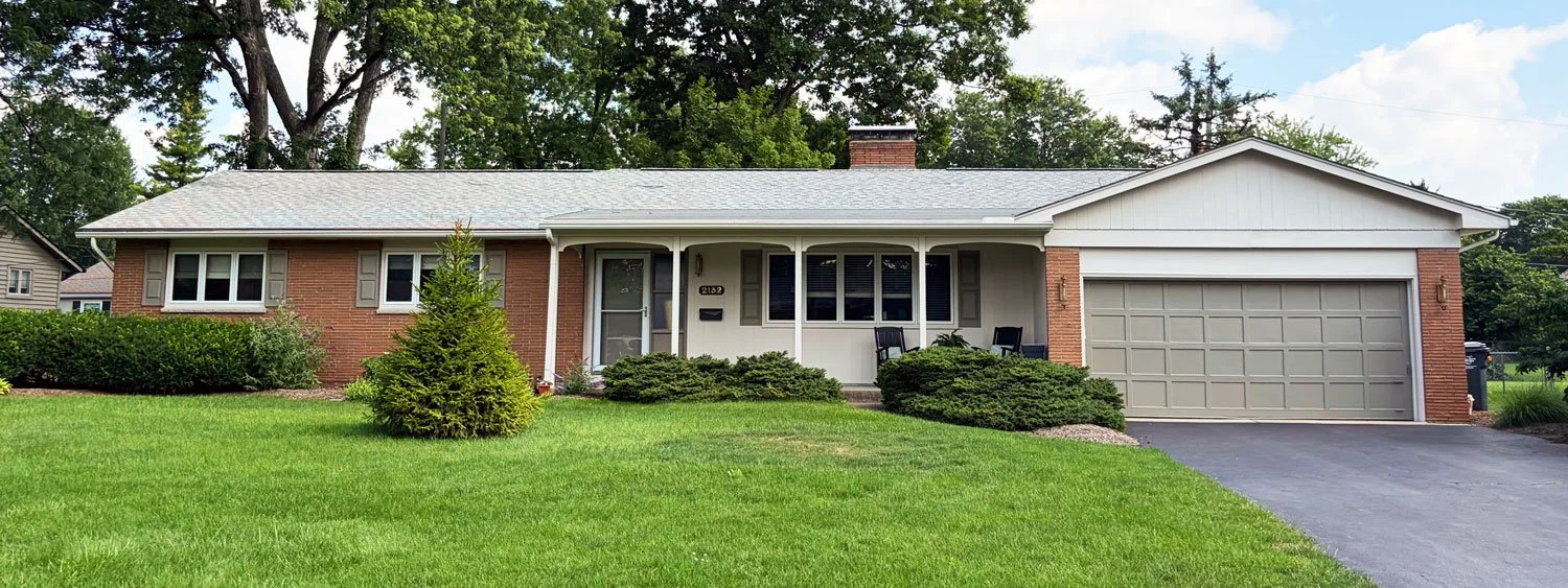 Before and after exterior paint transformation of a mid-century brick ranch in Columbus, OH