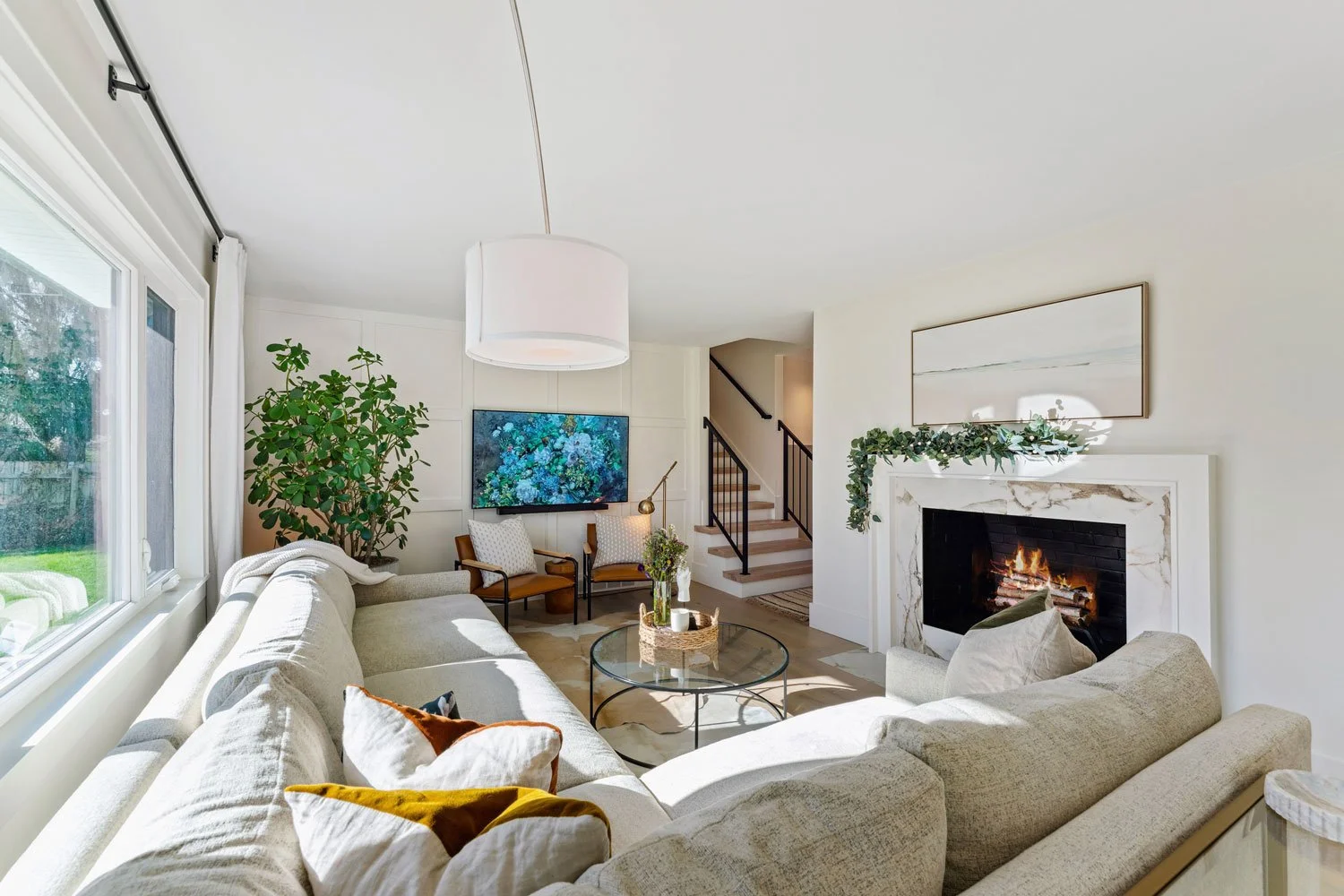 renovation living room with applied moulding wall moulding and fireplace