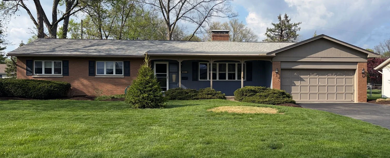 Before and after exterior paint transformation of a mid-century brick ranch in Columbus, OH