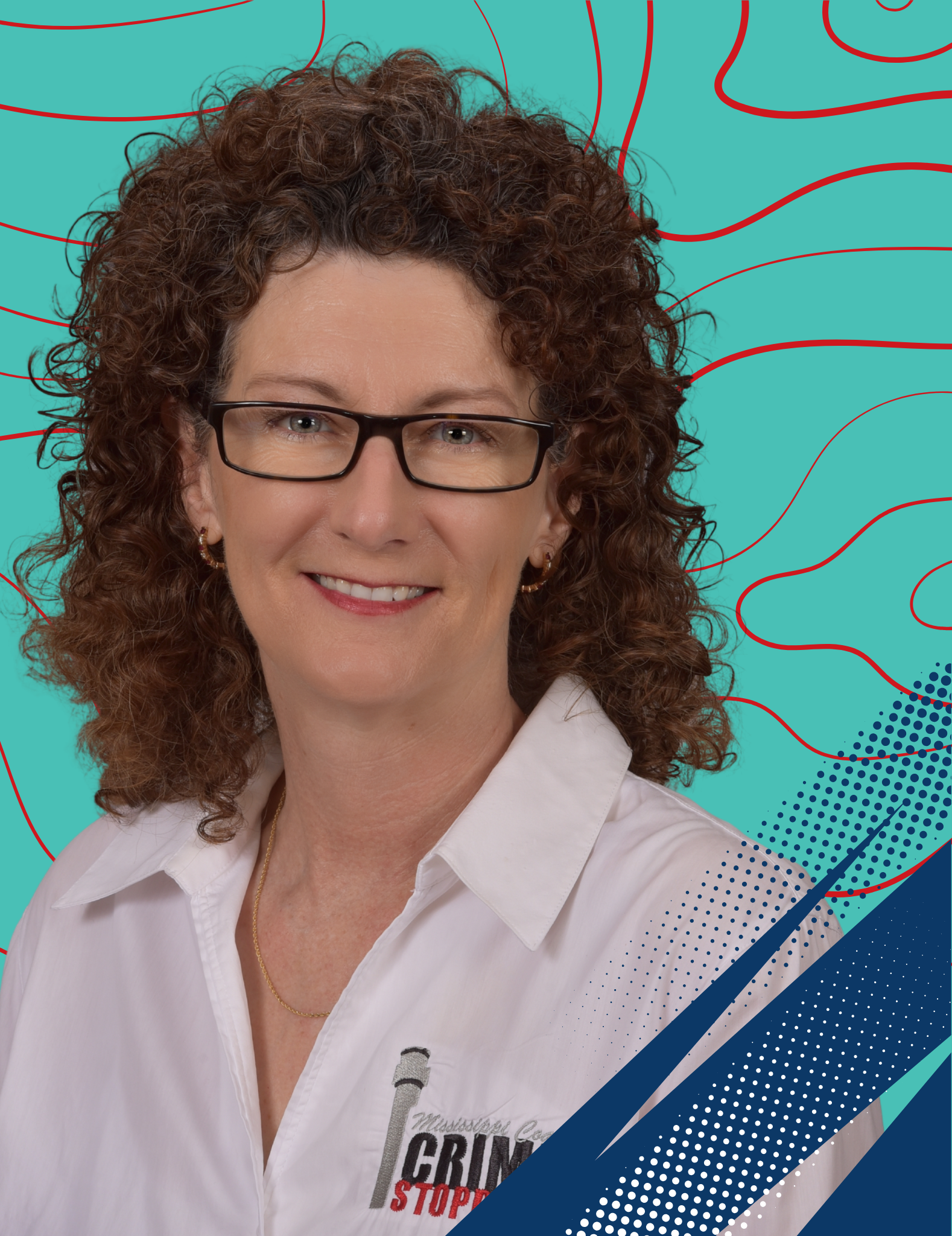 A person with curly hair wearing glasses and a white shirt with a "Mississippi Coast Crime Stoppers" logo, posing against a neutral background.