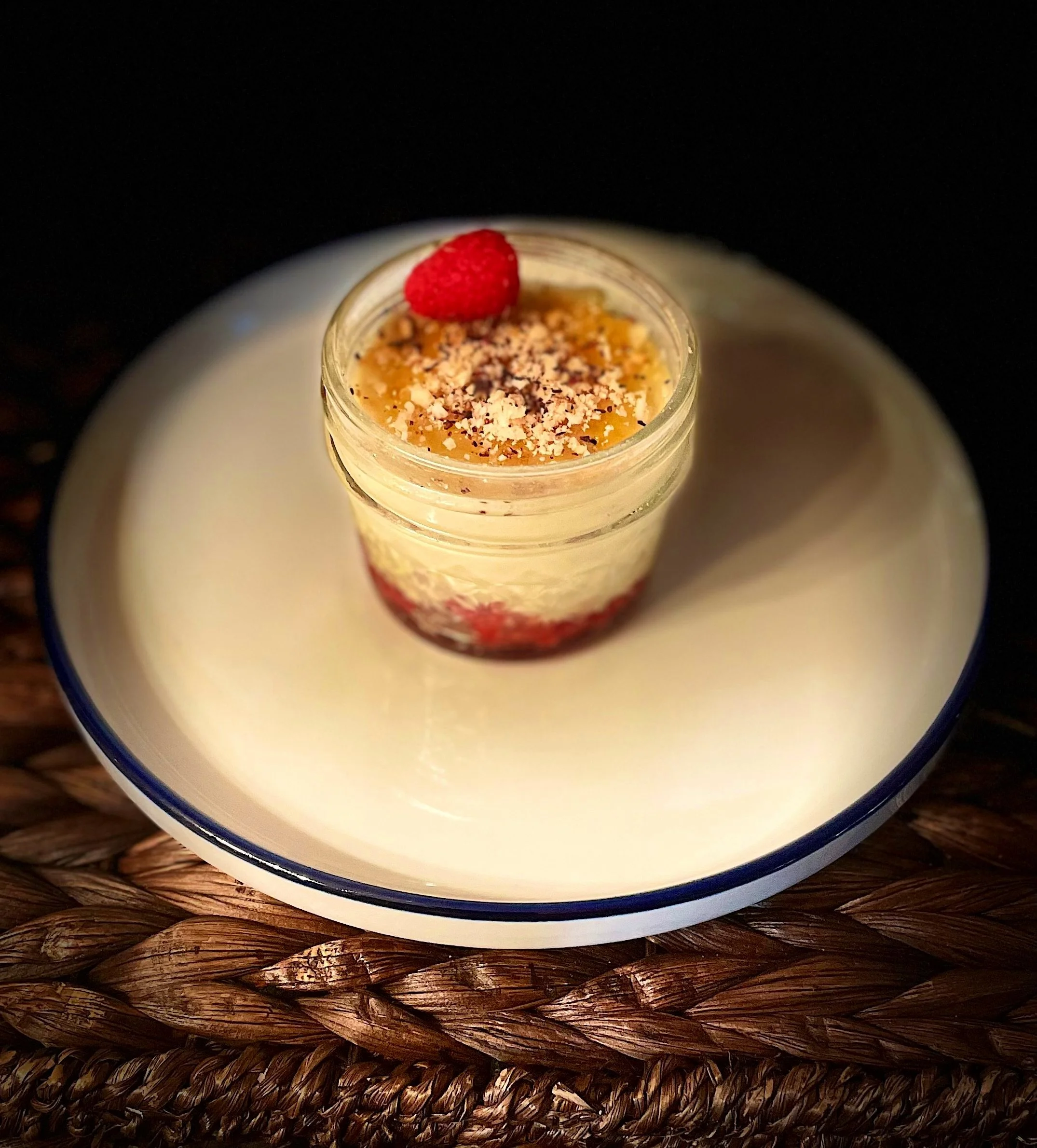 rose water crème brûlée. raspberries. toasted hazelnut. rose hips.