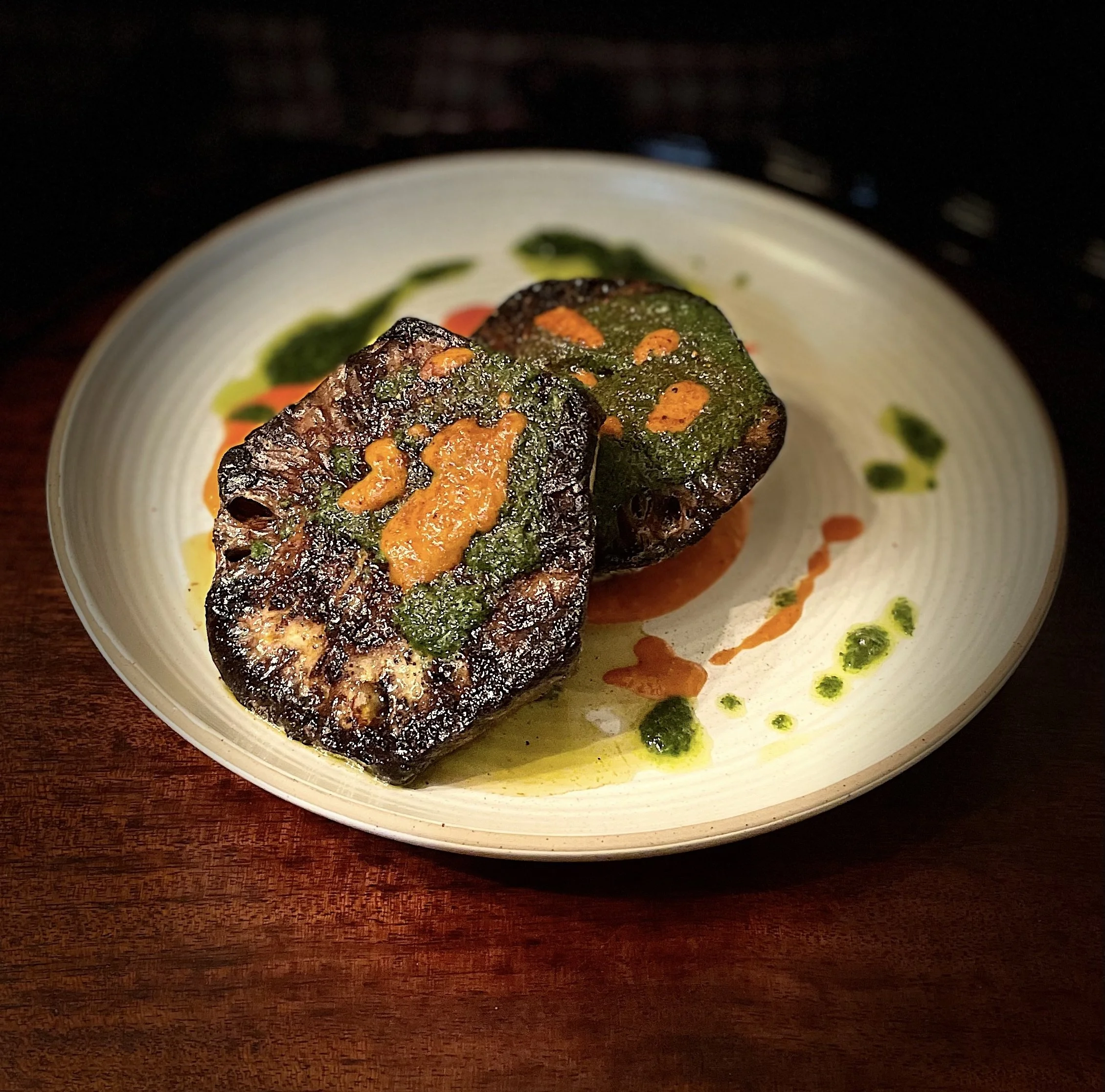 roasted celery root. brown butter. bell pepper cream. harissa. pesto.