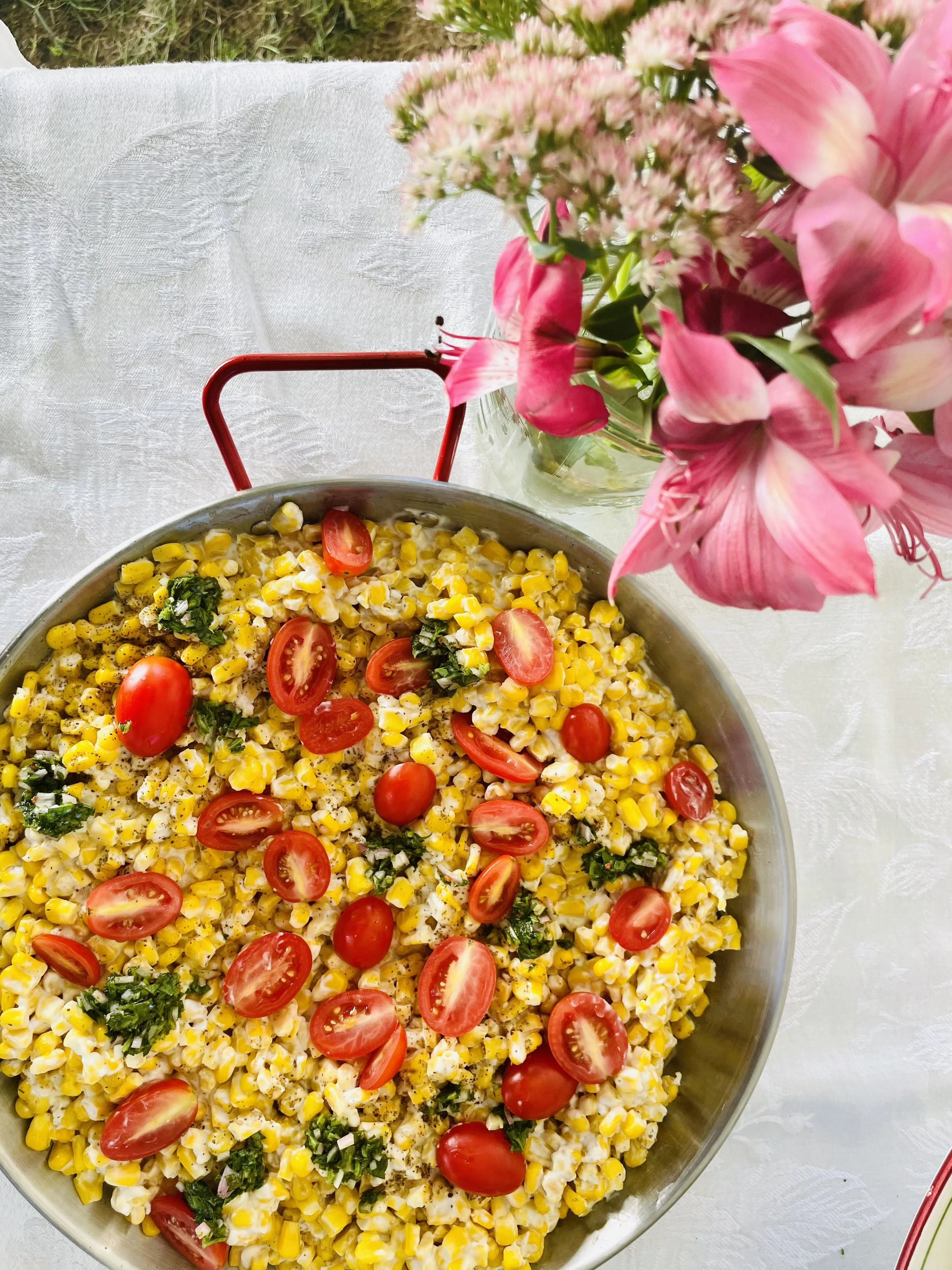 vegan corn succotash customized by guest for modification no garlic. basil gremolata. tomatoes. coconut milk. za’atar. from a 50 person family style catering event in 2023 monmouth county new jersey caterer private dining chef near me