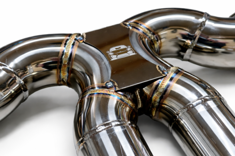 Close-up of ECG Performance Porsche stainless steel valved exhaust with precision welds