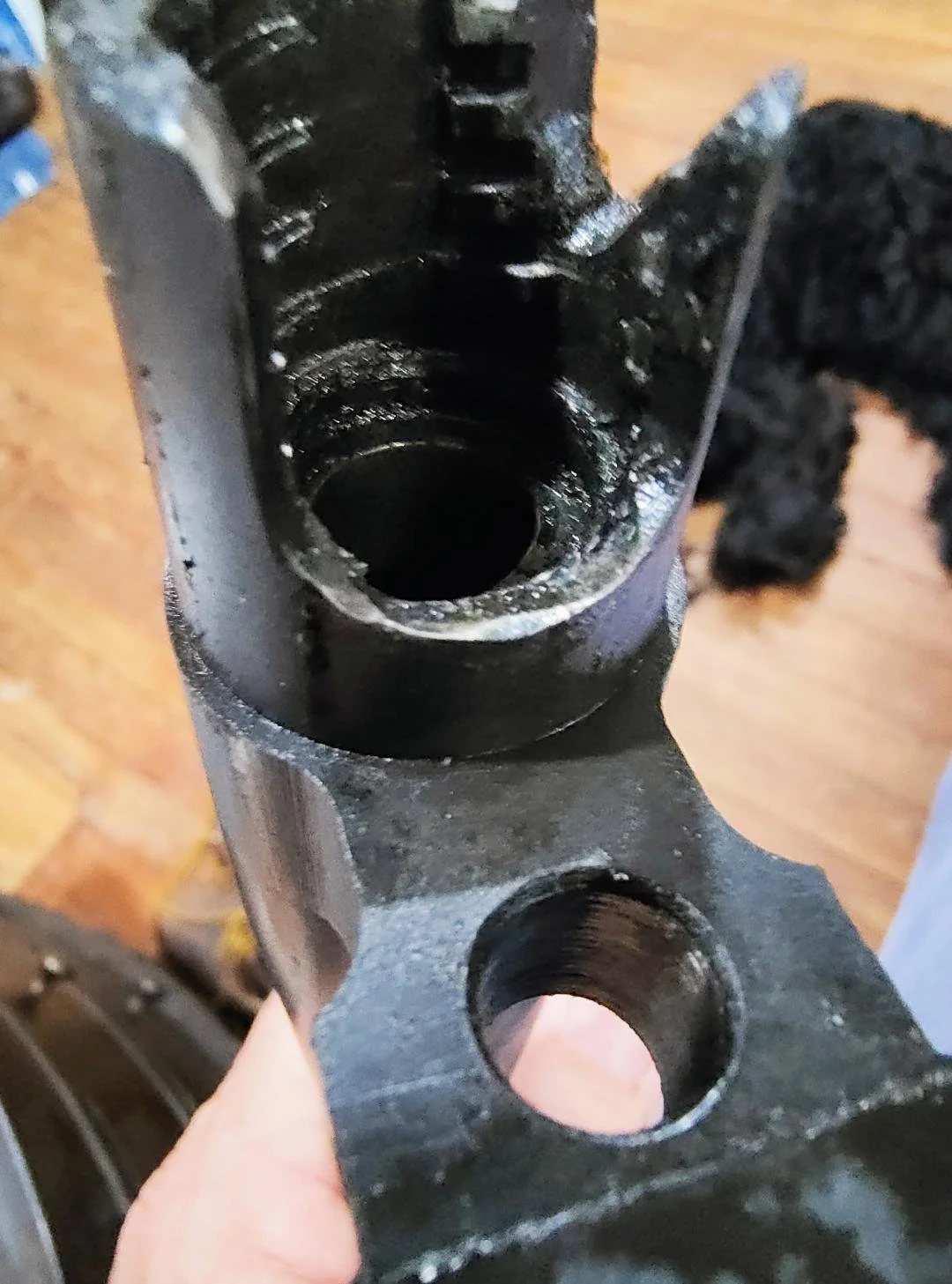 Image of a barrel and chamber given to us before cleaning services. We clean and reassemble all components.