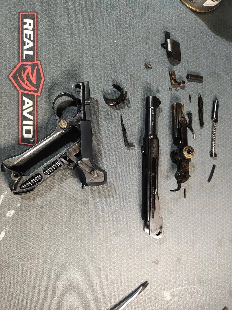 A Luger P08 after hot bluing treatment.