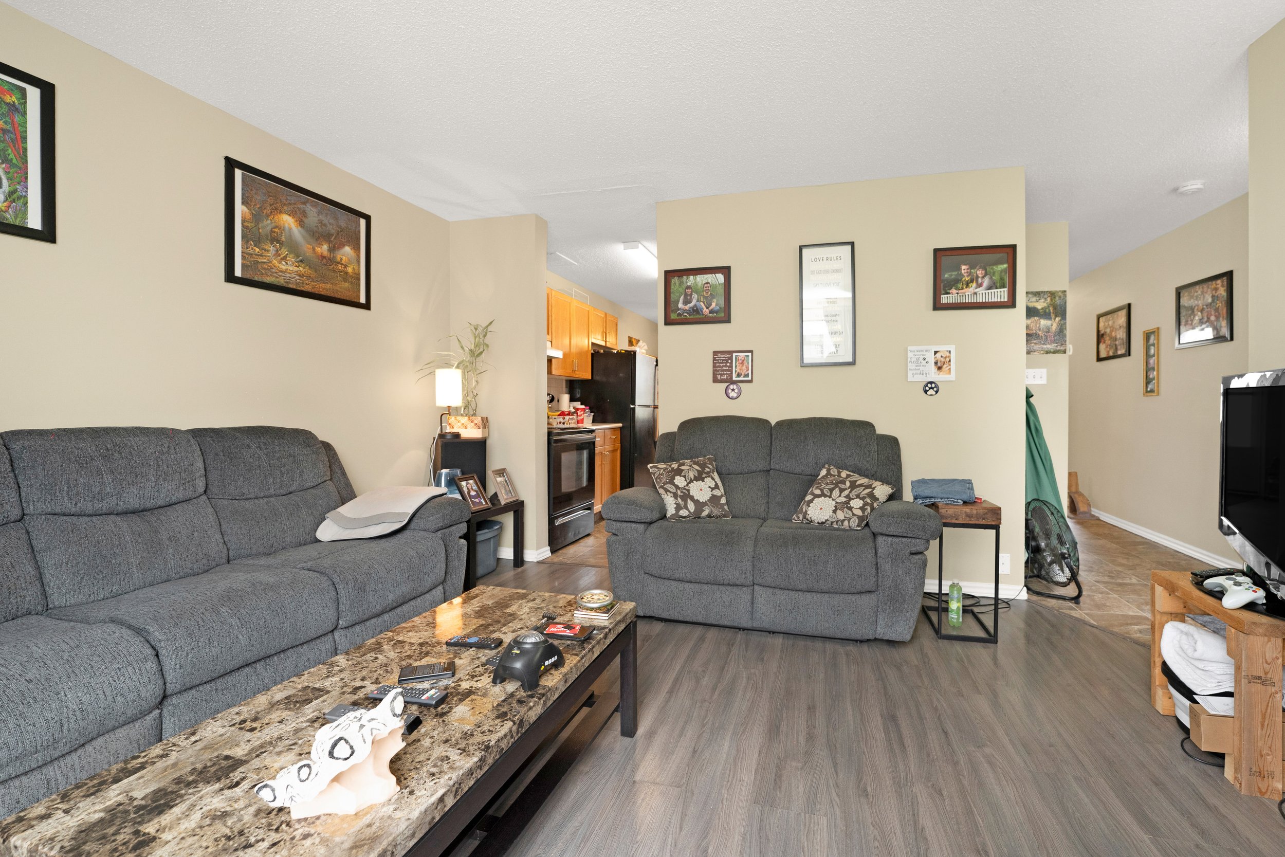 Bright living room with comfortable seating and decor.