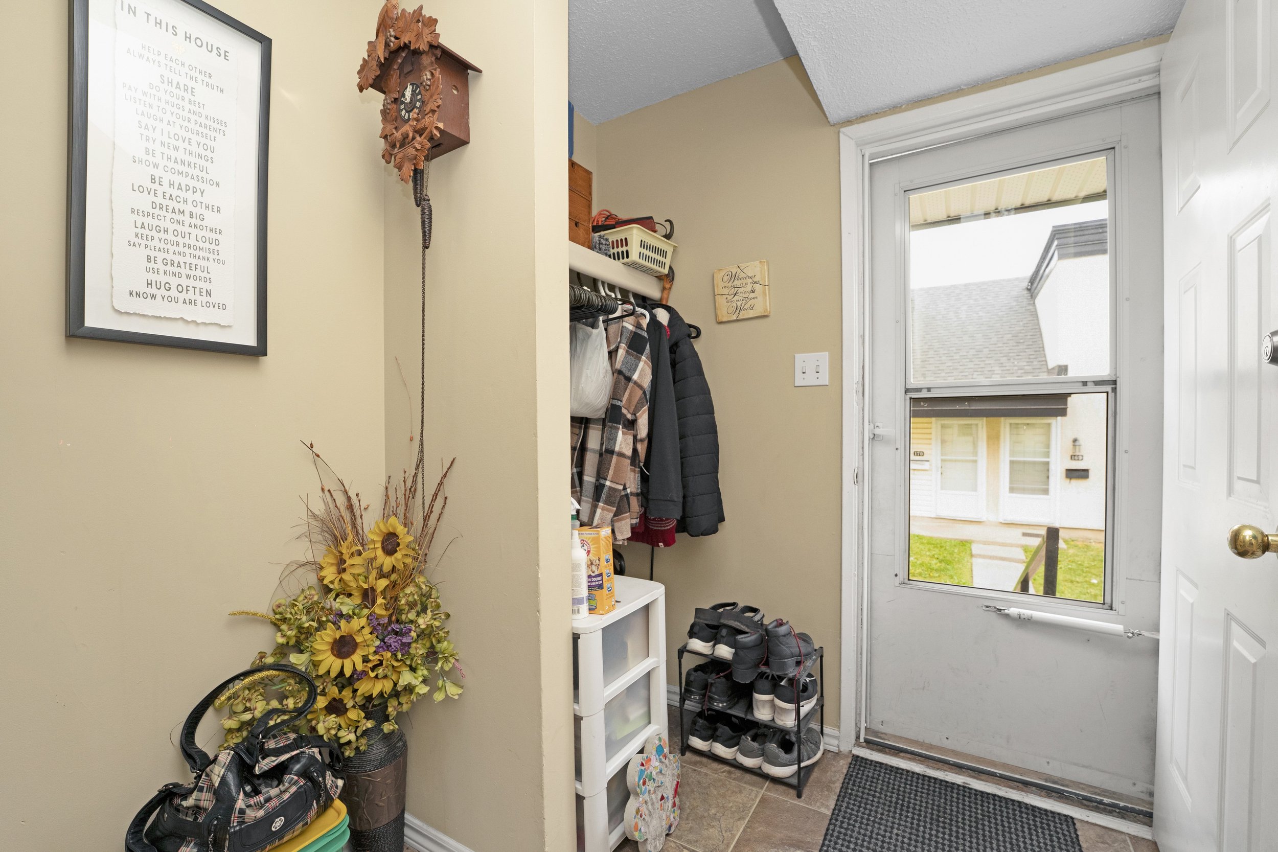 Cozy hallway interior with wall art and natural light.