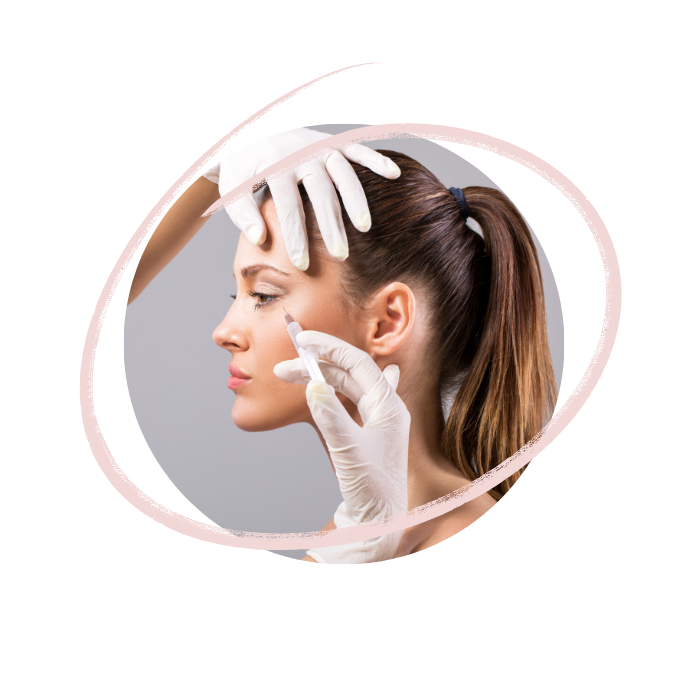 A woman receives an injection in her cheek from a healthcare professional wearing gloves, with a hand on her forehead.