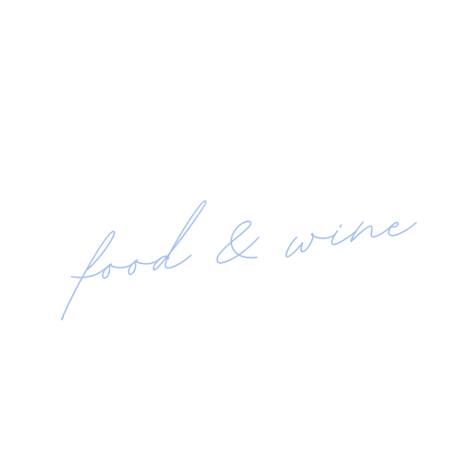 A white background with the words 'food & wine' in light blue script font.