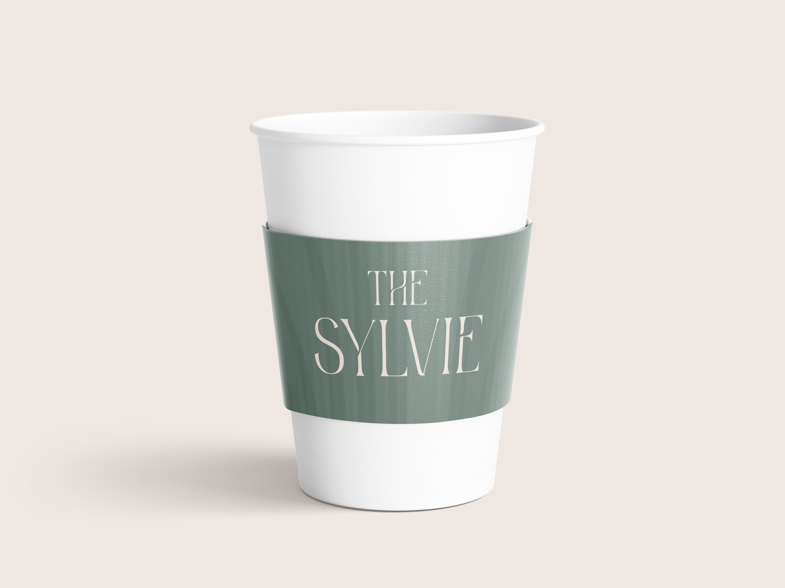 TheSylvie_CoffeeCupSleeve-Mockup.png