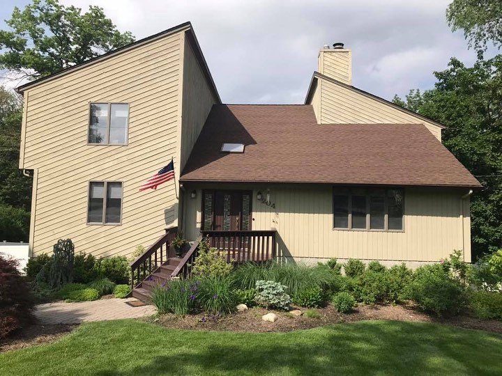 Way Back stained black siding painted all trim gloss black painted dark Gray Roof !