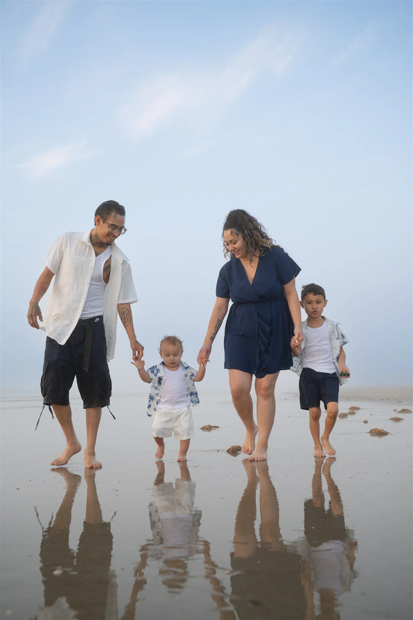 houston family playing outside with toddler and young son