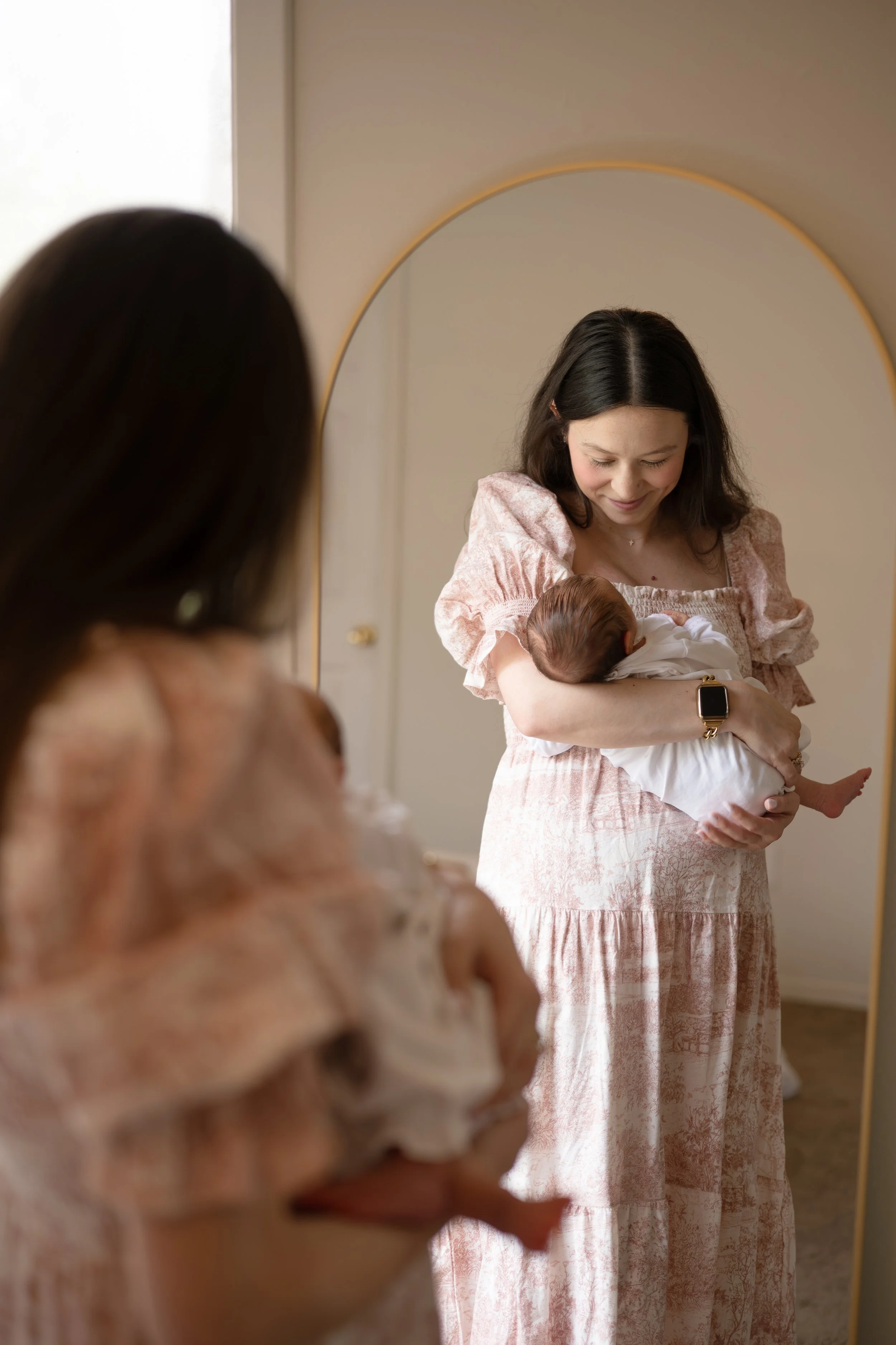 houston mom holding newborn at home