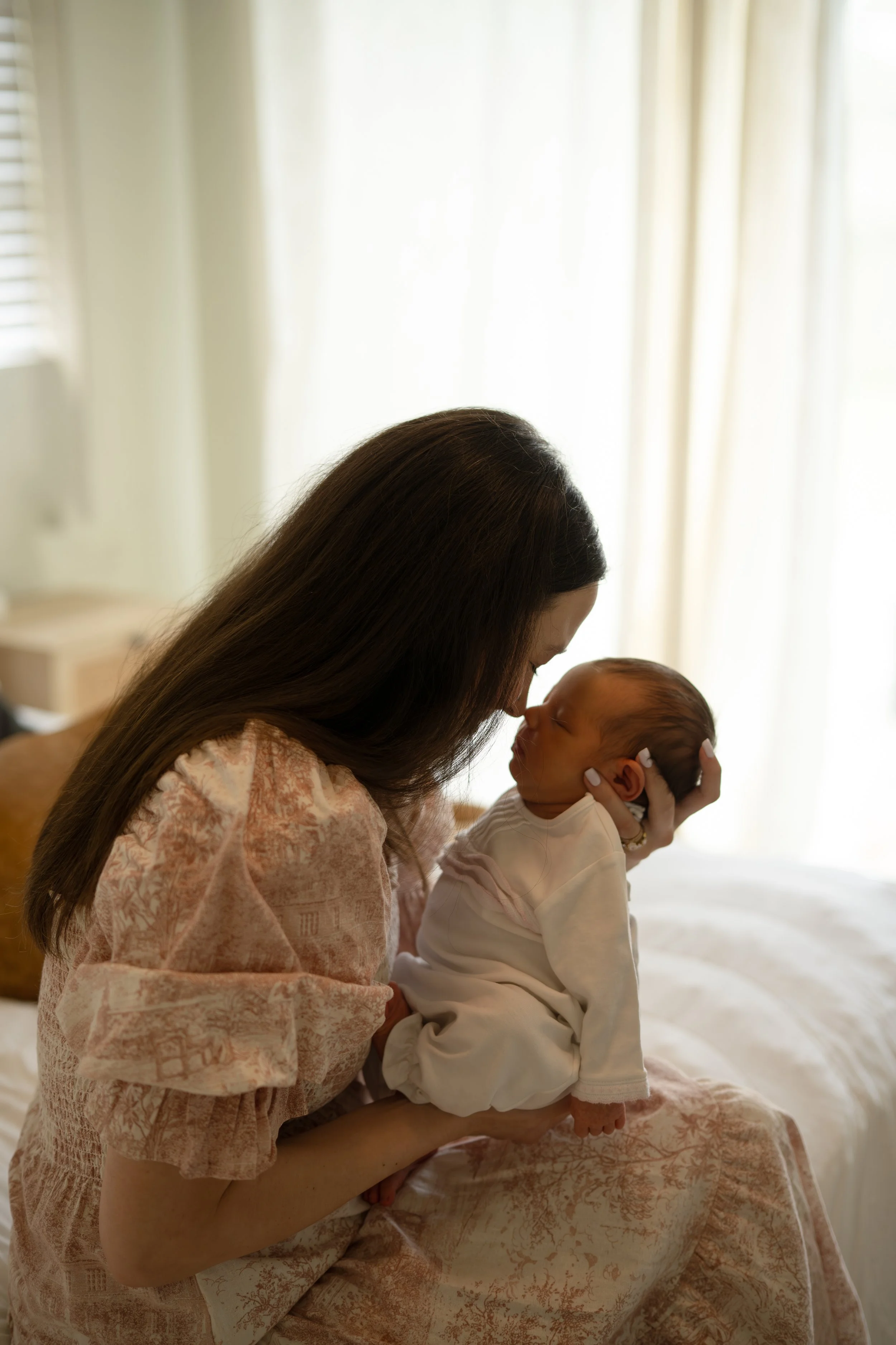 houston mom nose to nose with newborn baby at home