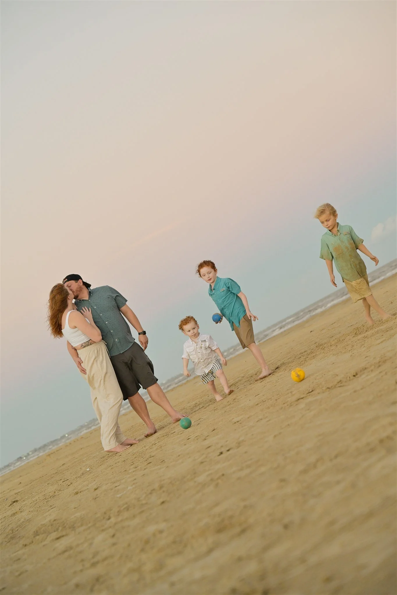 family photo session on the beach at sunset houston