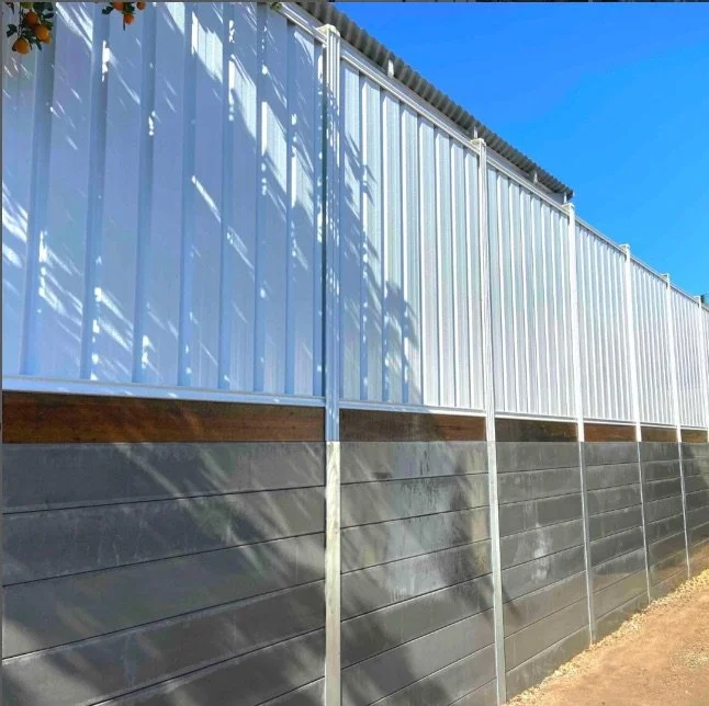 Colorbond fence with concrete sleeper retaining wall Sydney