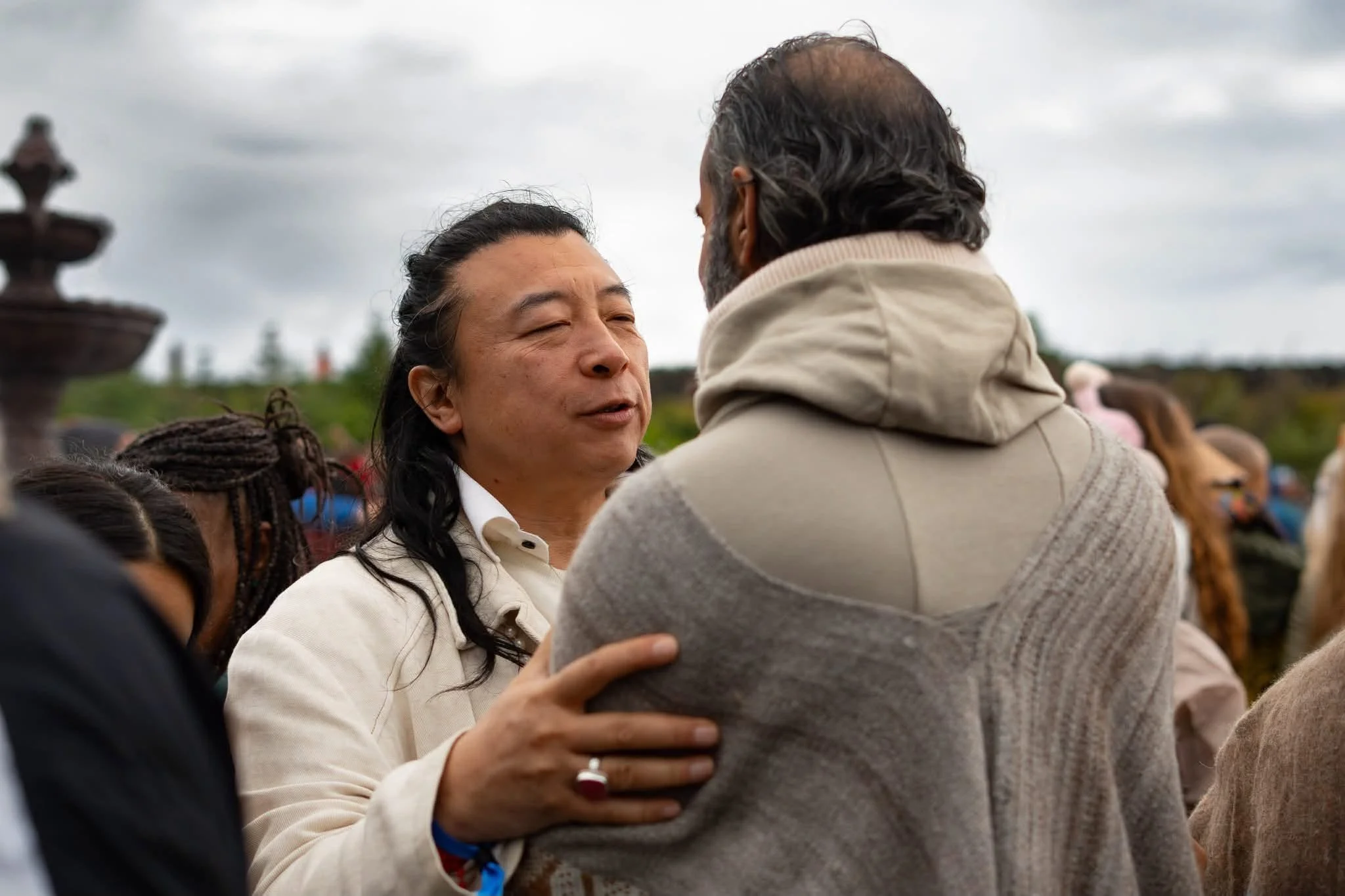 Shen Tong in meditation outdoors during the Iceland Eclipse 2026 gathering