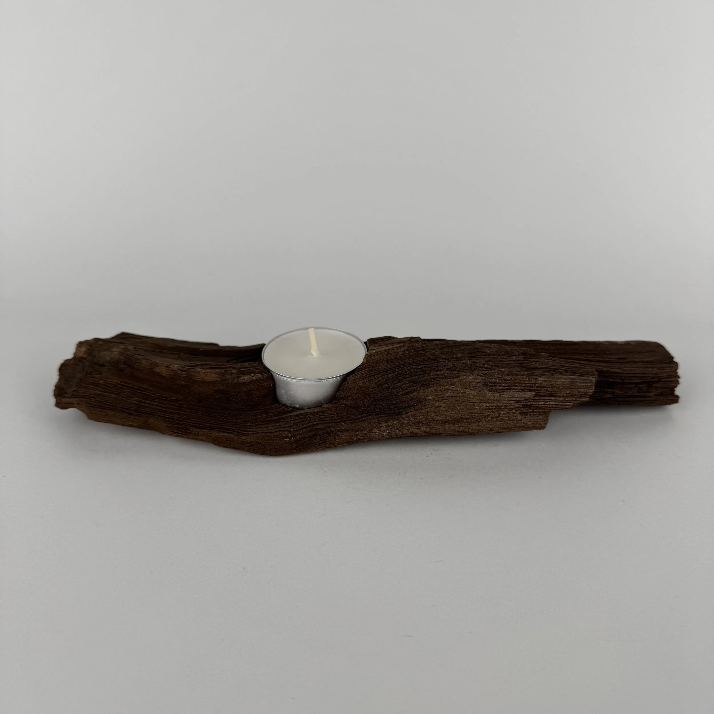 Kerzenhalter aus versteinertem, fossilem Holz