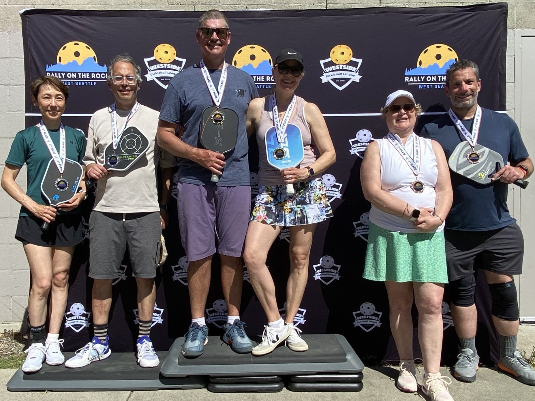 RALLY ON THE ROCK JUNE 2025:  Mixed Doubles, Under 3.0, 50+ (l-r)   ~   SILVER: Aya Nakazato & Dan Bremson.   ~   GOLD: Kevin Soley & Nicole Soley.   ~   BRONZE: Jamee Fields & Sebastien St Laurent