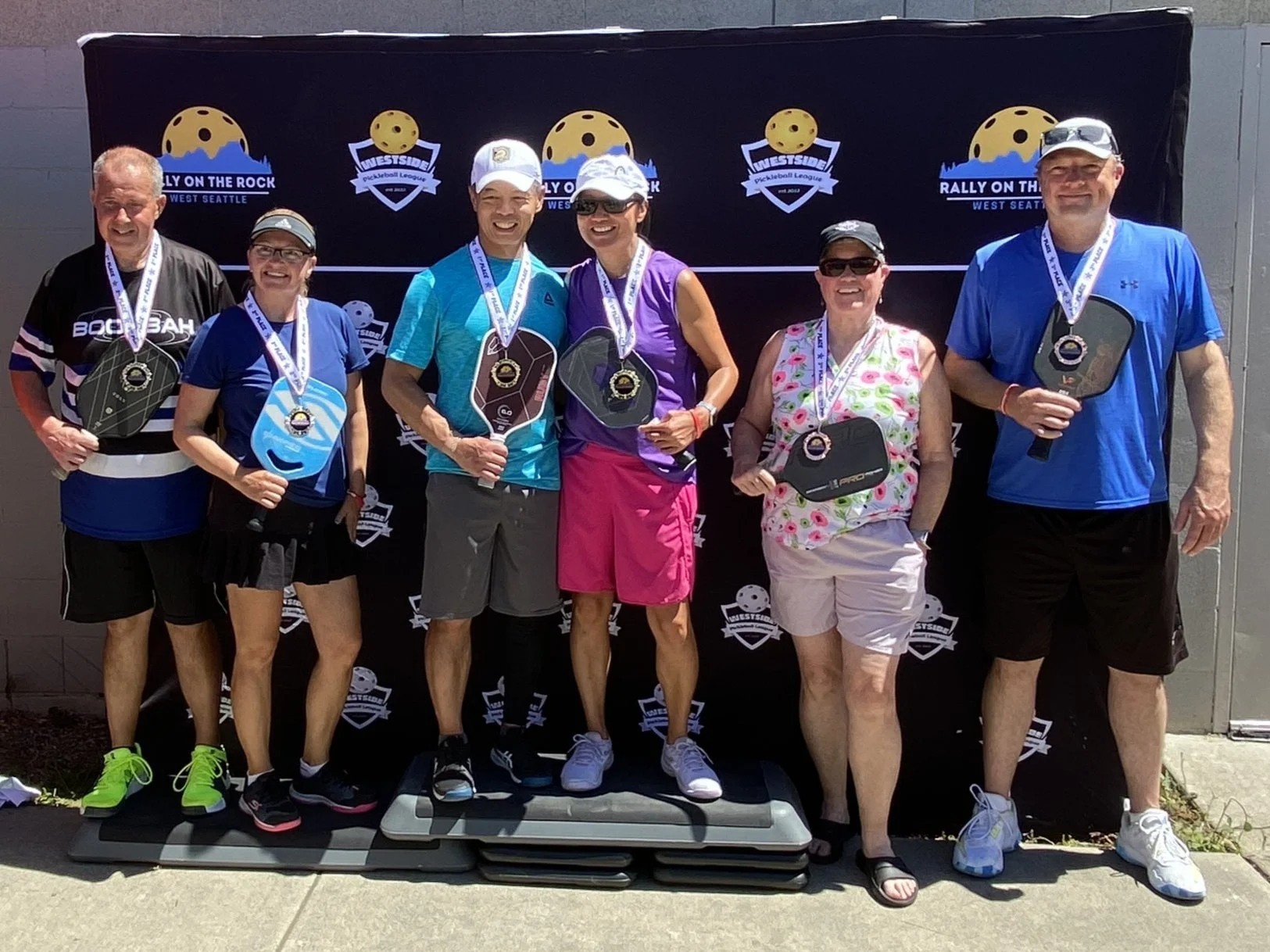 RALLY ON THE ROCK JUNE 2025:  Mixed Doubles, 3.5, 48+ (l-r)   ~   SILVER: Gaelen Barrie & Gina Cotner.   ~   GOLD: Tom Reyes & Pauline Reyes.   ~   BRONZE: Kathleen Benson & Justin Stacey.