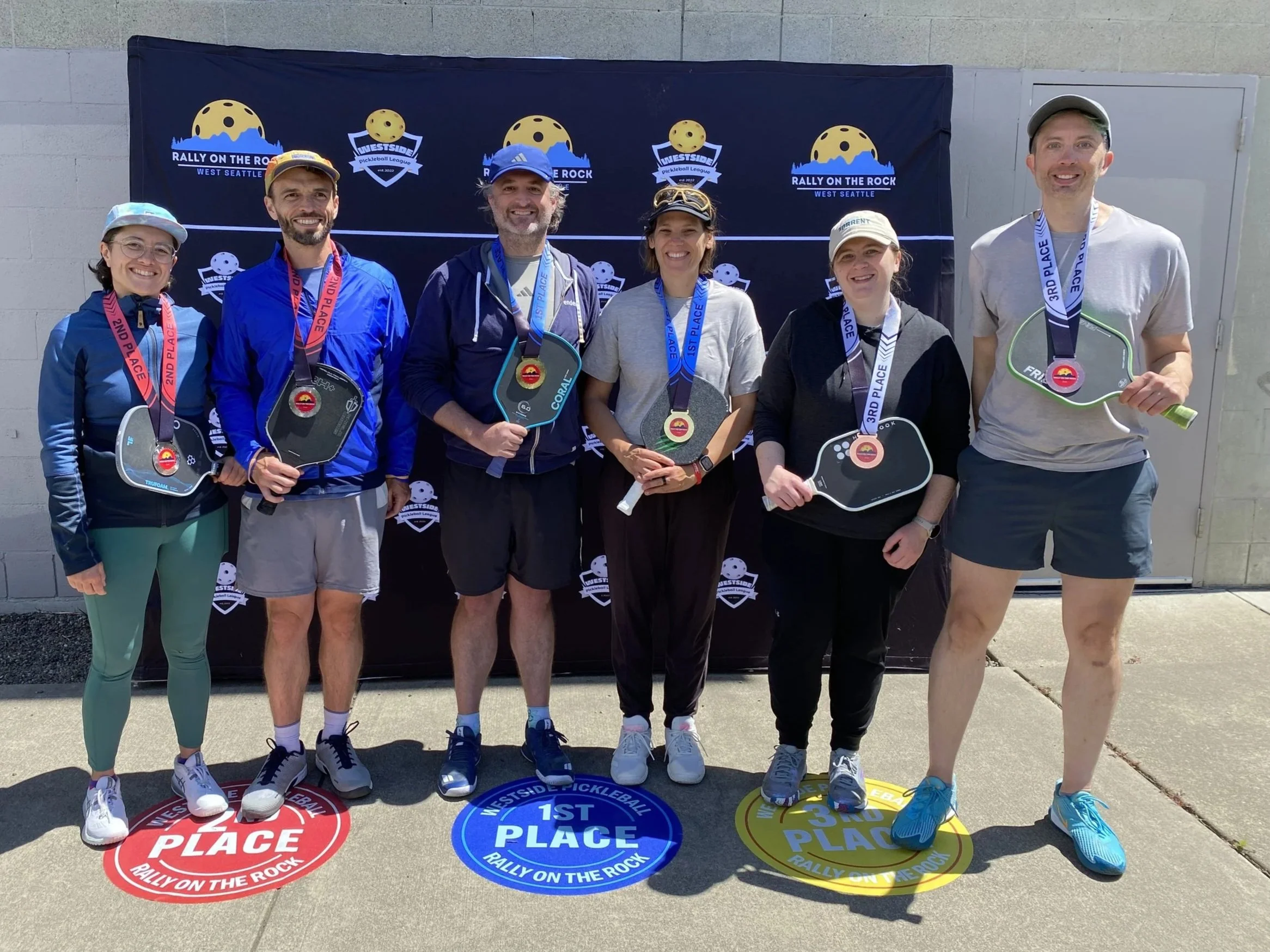 RALLY ON THE ROCK JUNE 2026:  Mixed  Doubles, 3.0, 35-49 (l-r)   ~   SILVER: Helen Stillman & Alex Williams.   ~   GOLD: Chris Castle & Allison Gifford.   ~   BRONZE: Rachel Cantrell & Ben Cantrell.