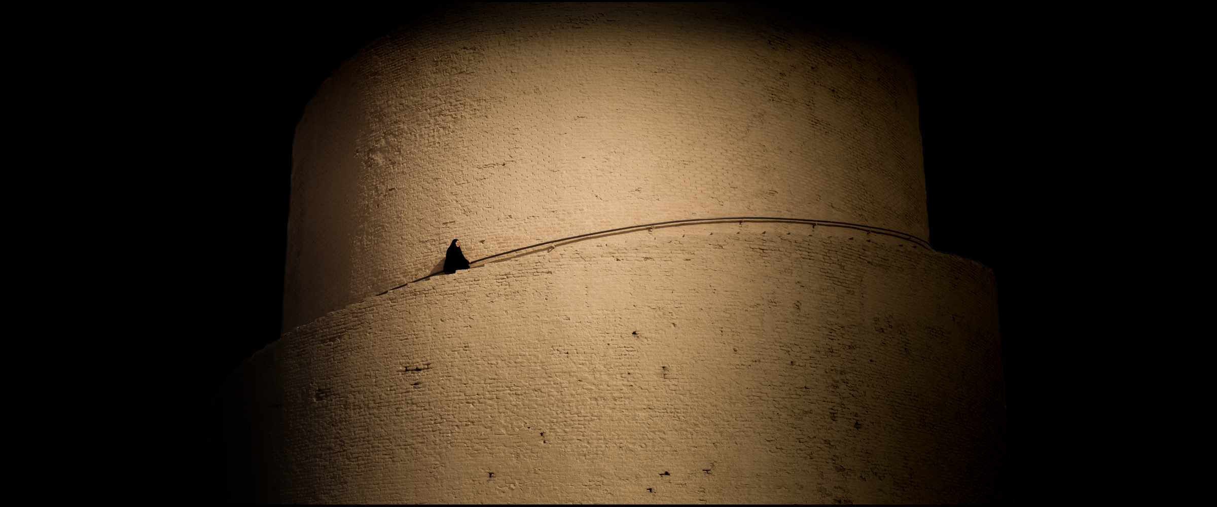 Samarra minaret close-up showcasing intricate spiraling architecture in golden sandstone.