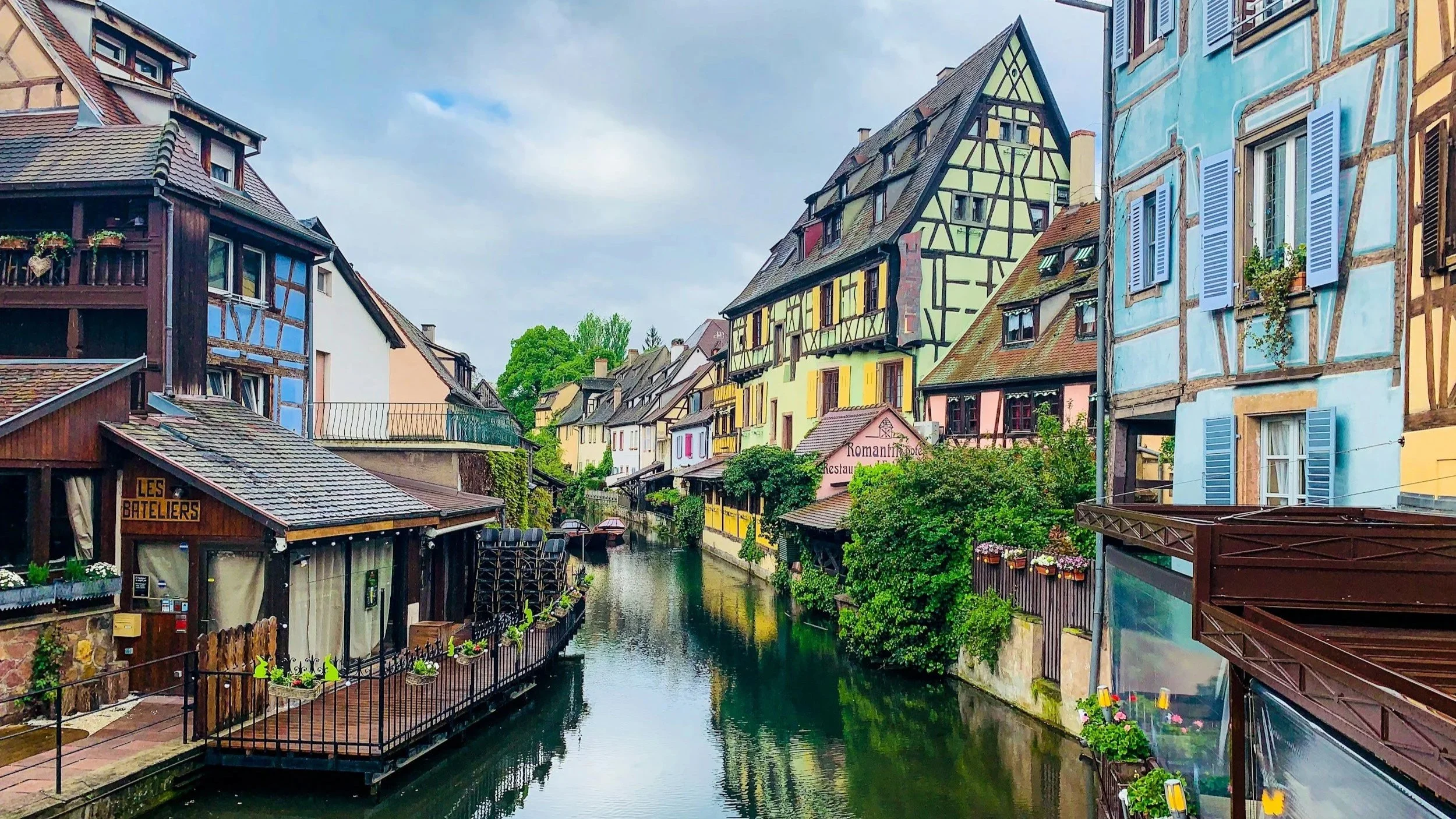 Colmar canal overlooking restaurants and village