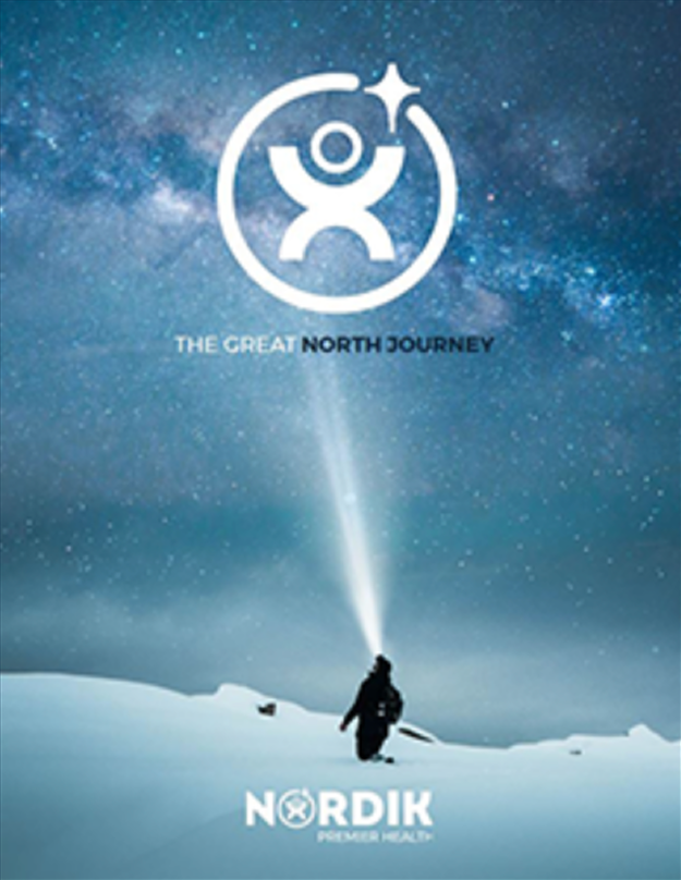 A person in winter gear walking in a snowy landscape at night, shining a flashlight into the starry sky. An illustration of a joyous figure with a star on its head is above, with the text "The Great North Journey". The logo and words "Nordik Premier Ajout" are at the bottom.