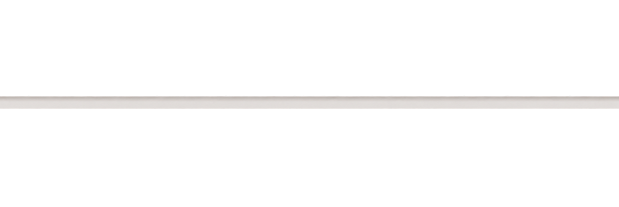 Close-up of a sleek, modern laptop with a slim profile, silver exterior, and black screen, viewed from the side.