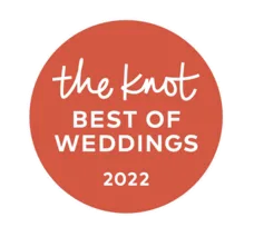 Red circular logo with white text reading 'the knot BEST OF WEDDINGS 2022'