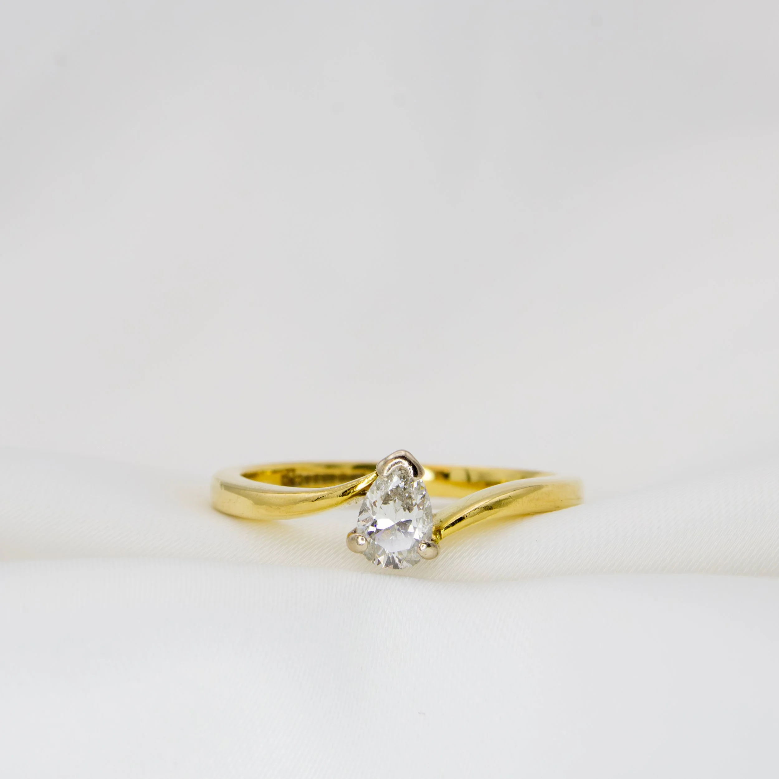 Pear Cut Diamond Wave Solitaire Ring Jacksons Jewellers 5.jpg