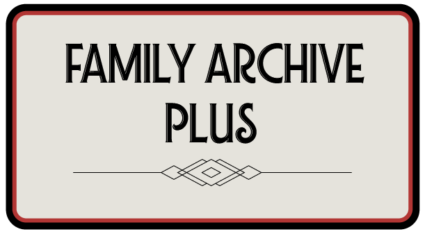 Sign with black text that says "Family Archive Plus" on a light background with a red border.