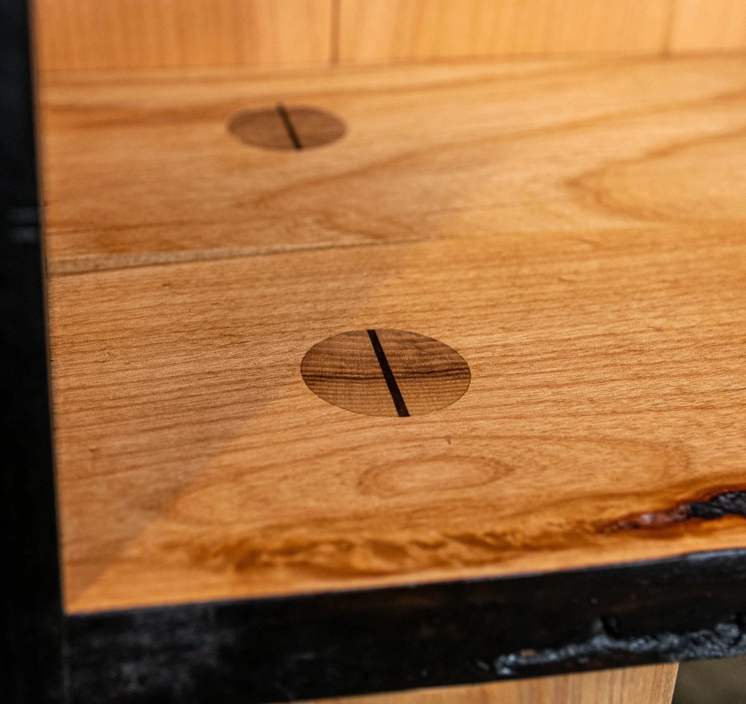 Detail image of wedged mortise and tenon joint inside display cabinet