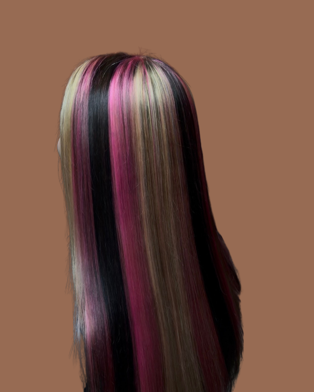 person with light pink and blonde highlights