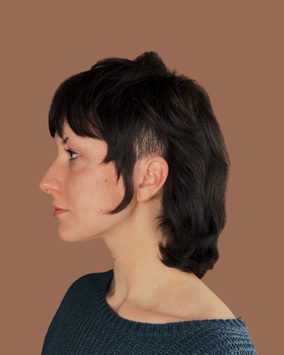 person with short black hair