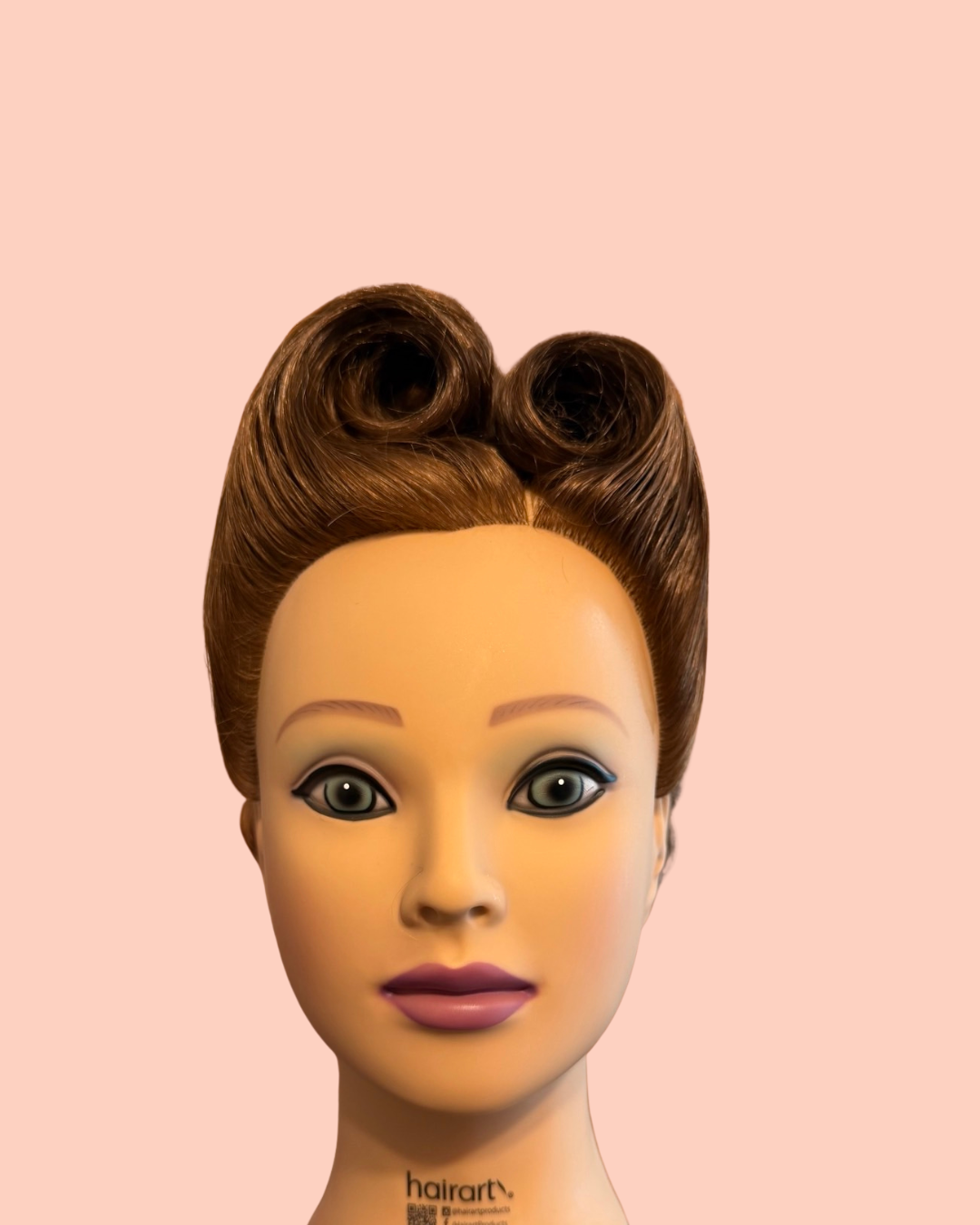 mannequin head displaying vintage hair style