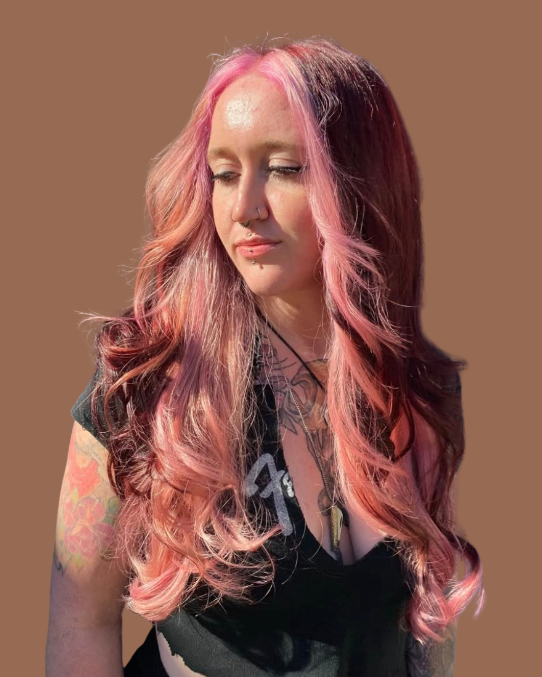 person with pink and purple long hair and layers