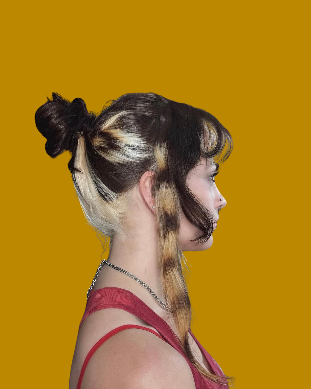 person with blonde and brown hair