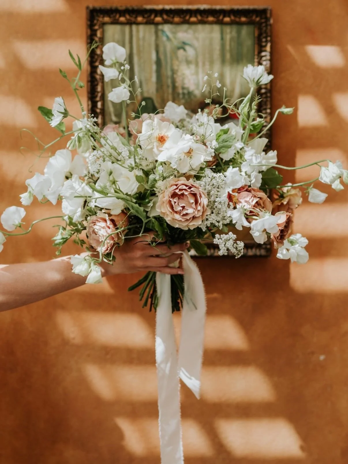 The hottest wedding of the year!

When Olivia and Eden booked the beautiful Langar Hall for their intimate wedding they were only thinking what their plan B would be if it rained. None of us were expecting the temperatures to soar to the 30s. Luckily