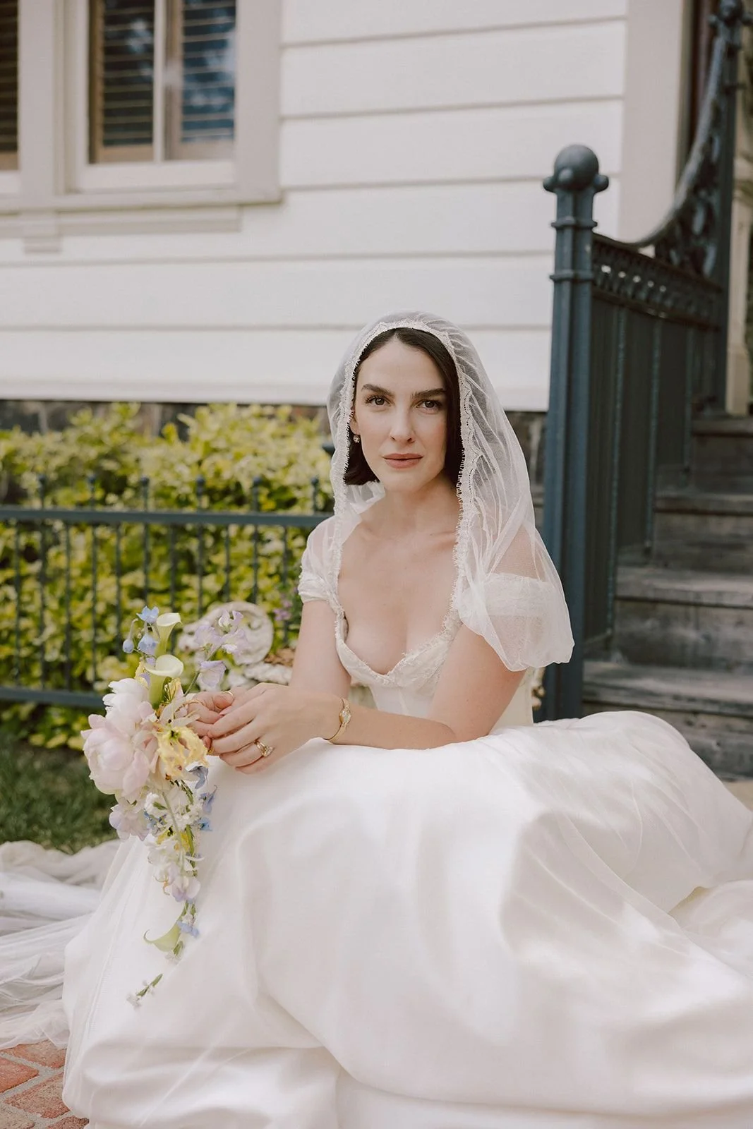 sonoma county wedding venue at triple s ranch bride outside house with bouquet