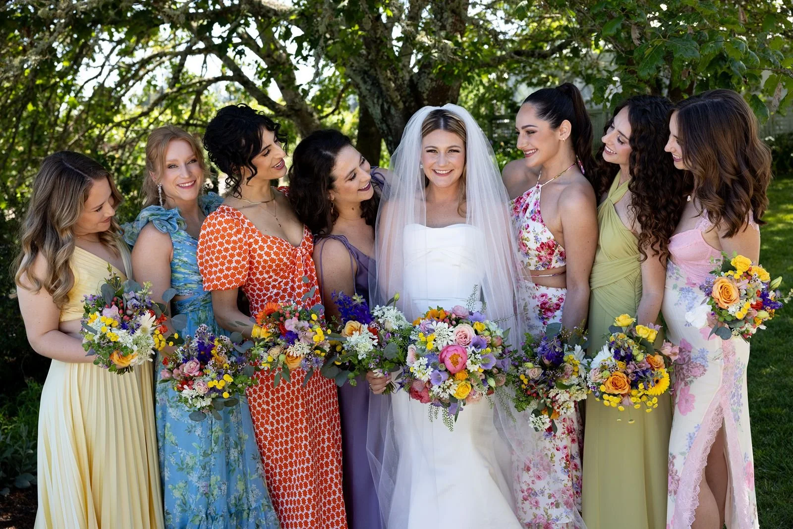 Vine Hill House brides with bridesmaid holding bouquets