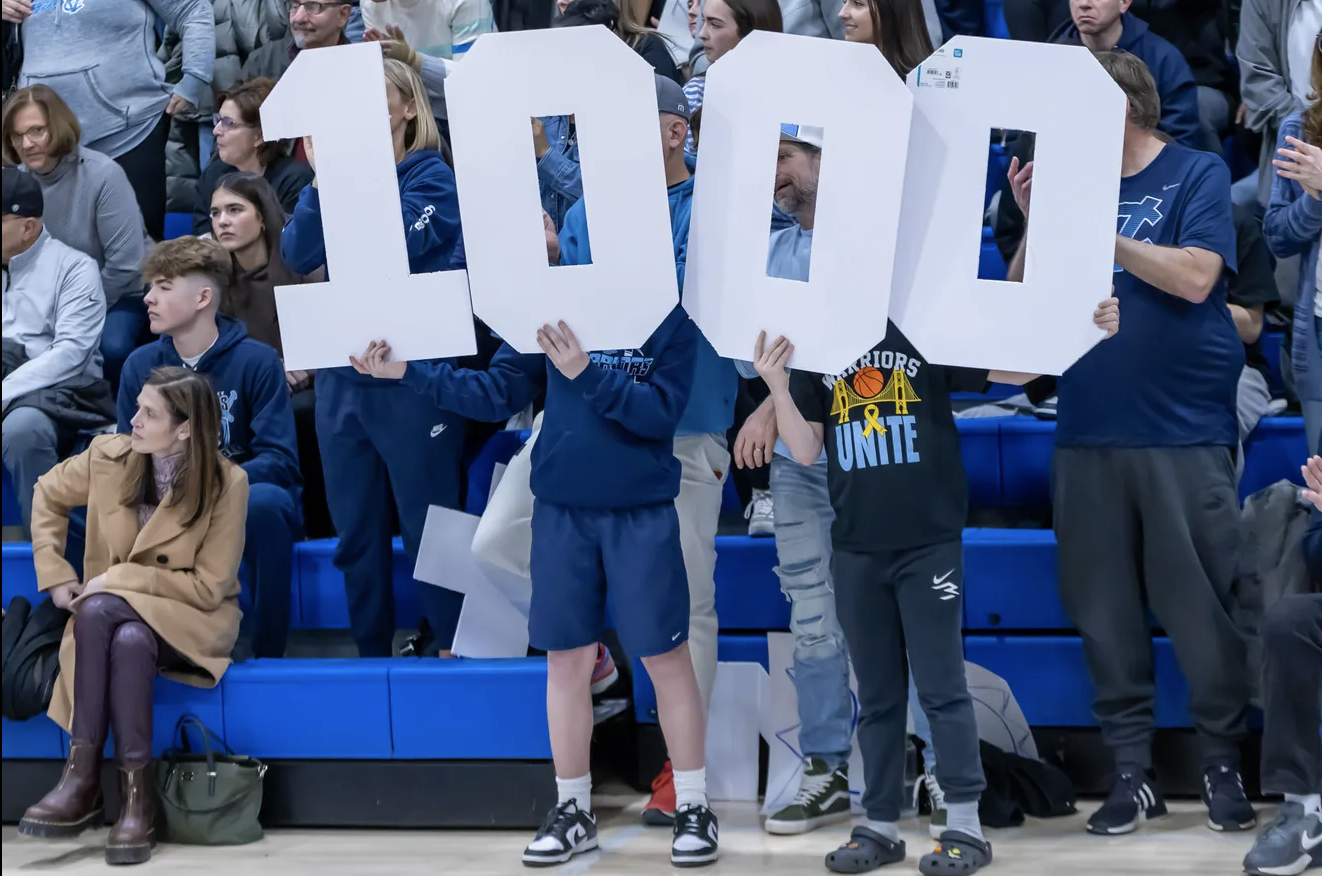 High School Senior Drops 1,000th point in playoff game.