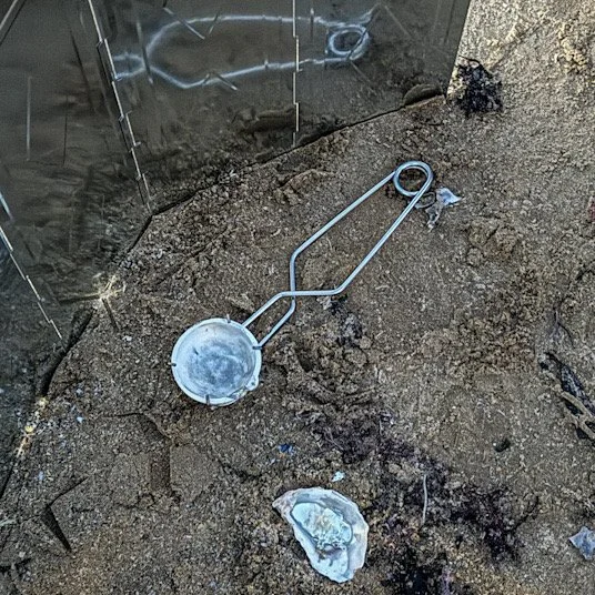 Pewter casting on the beach - art making within the environment