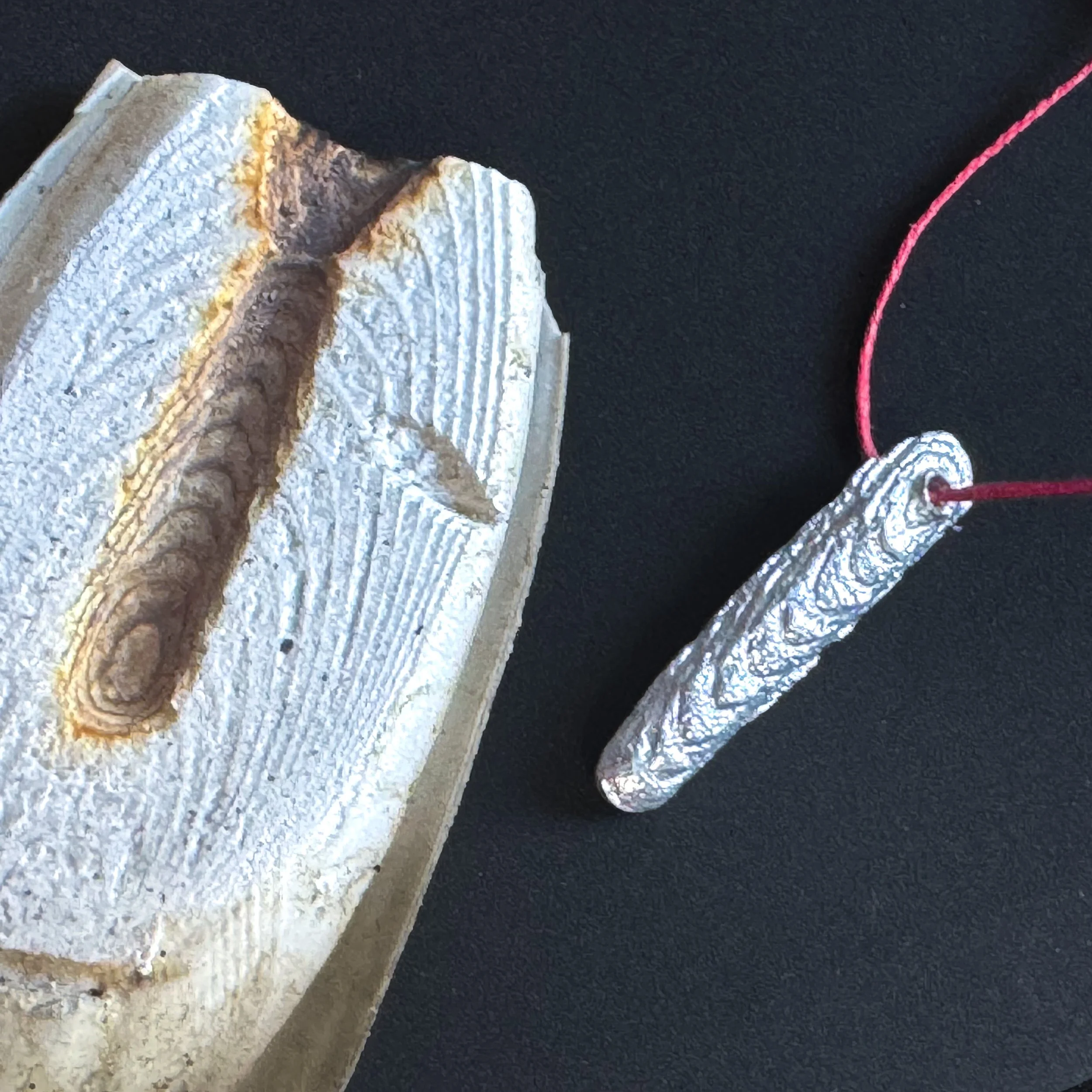 pewter casting into cuttlefish to create tactile grounding objects during times of stress