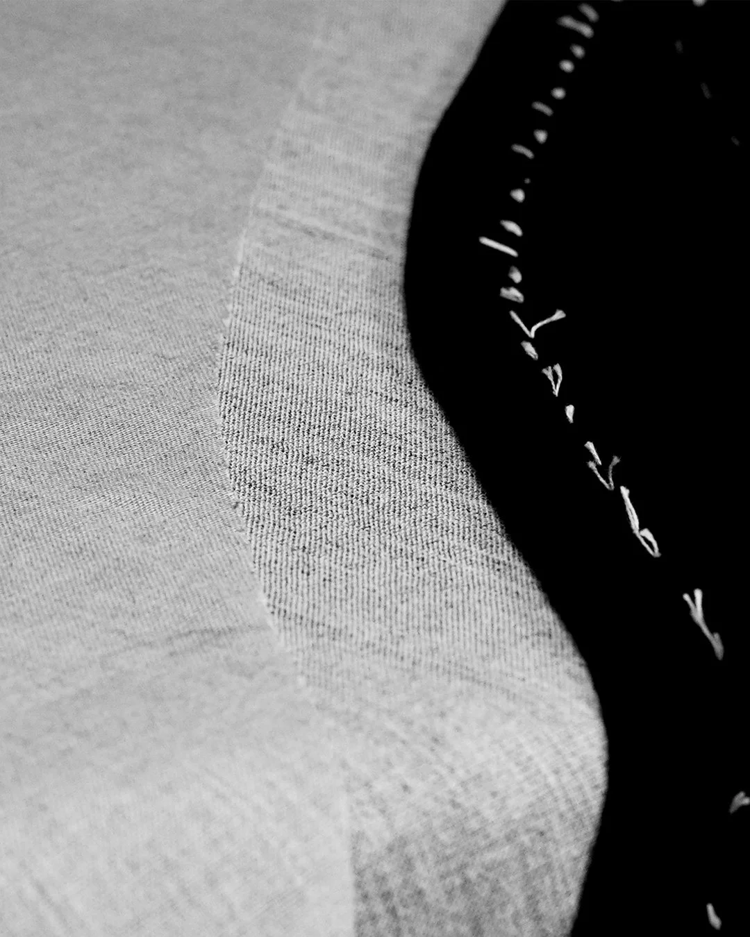 Lafóa Studio - Behind the scenes of a tailoring studio - A photograph of layers of tailor's canvasses.