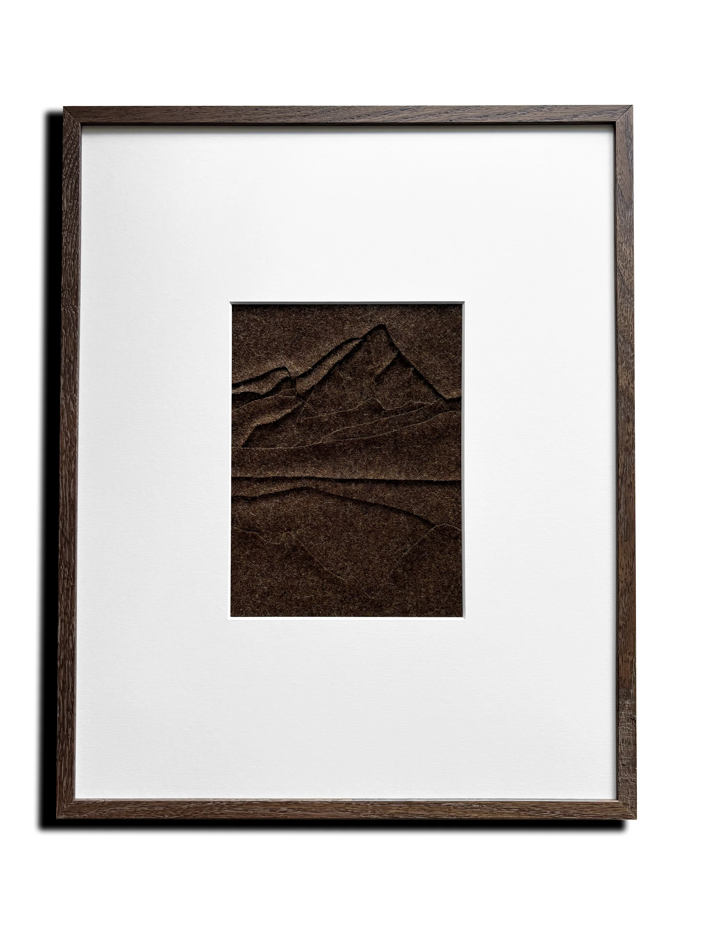 Hand sewn textile art created with 100% wool. Abstract landscape painting. Title: 'A Little Lake'. Color: Brown. Framed in dark oak wood with passe-partout. 40x50cm