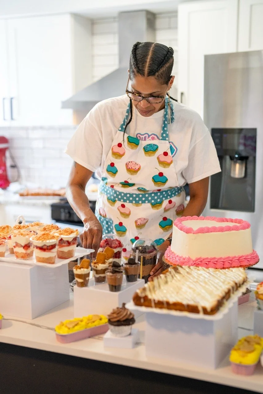 Danielle Jackson arranging sweets on a table